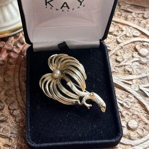 Vintage brooch with faux pearl